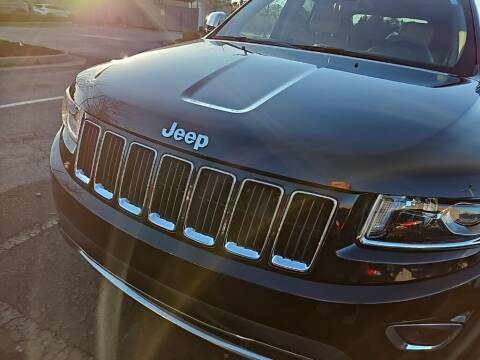 2014 Jeep Grand Cherokee for sale at Lou Sobh Kia in Cumming GA