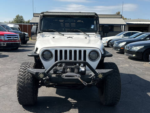 2005 Jeep Wrangler for sale at AJOULY AUTO SALES in Moore OK