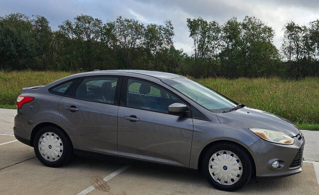 2012 Ford Focus for sale at CAR MARKET AUTO GROUP in Sugar Land, TX