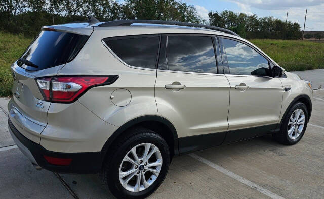 2018 Ford Escape for sale at CAR MARKET AUTO GROUP in Sugar Land, TX