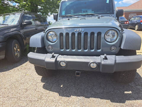 2015 Jeep Wrangler Unlimited for sale at Newport Auto Group in Boardman OH