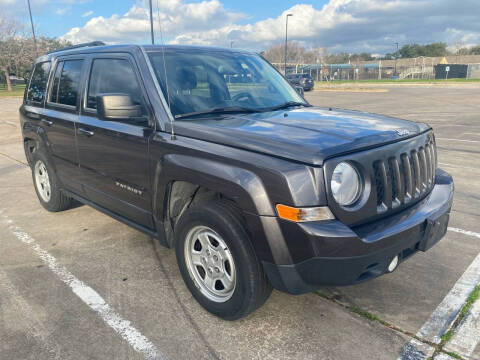 2016 Jeep Patriot for sale at SUPER DRIVE MOTORS in Houston TX