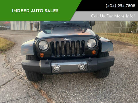 2011 Jeep Wrangler Unlimited for sale at Indeed Auto Sales in Lawrenceville GA