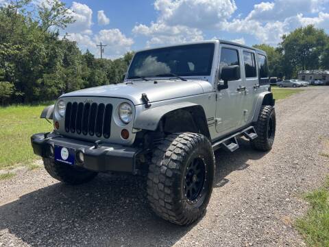 2012 Jeep Wrangler Unlimited for sale at The Car Shed in Burleson TX