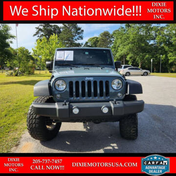 2014 Jeep Wrangler for sale at Dixie Motors Inc. in Northport AL