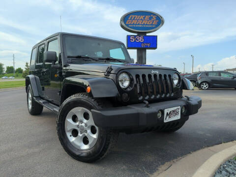 2013 Jeep Wrangler Unlimited for sale at Monkey Motors in Faribault MN