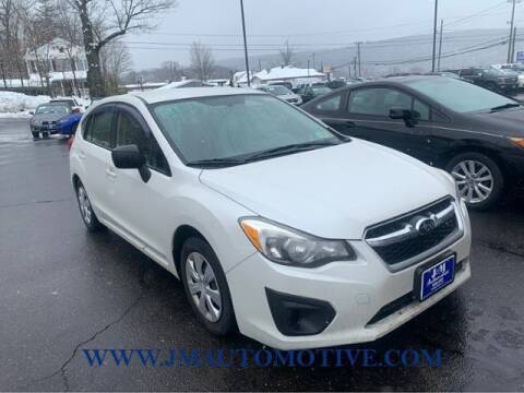 2014 Subaru Impreza for sale at J & M Automotive in Naugatuck CT