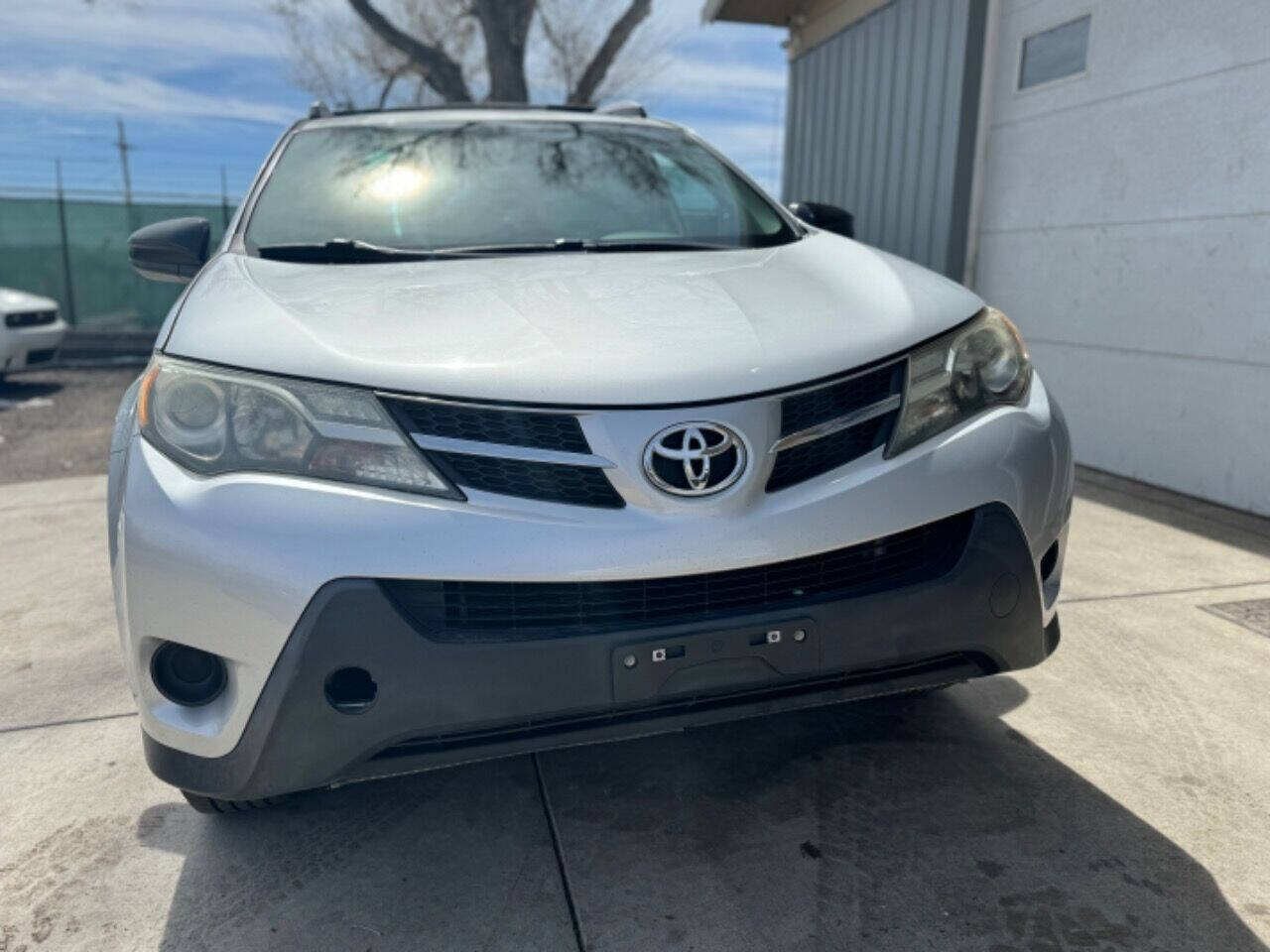 2014 Toyota RAV4 for sale at Carlos Auto Sales LLC in Englewood, CO