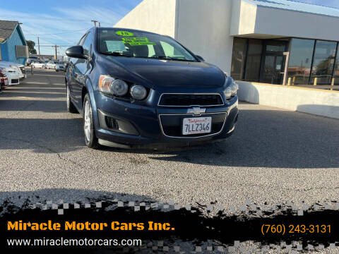 2015 Chevrolet Sonic for sale at Miracle Motor Cars Inc. in Victorville CA