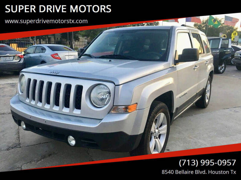 2012 Jeep Patriot for sale at SUPER DRIVE MOTORS in Houston TX