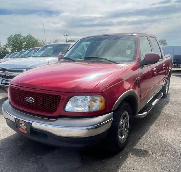 2001 Ford F-150 for sale at MILLENIUM MOTOR SALES, INC. in Rosenberg TX