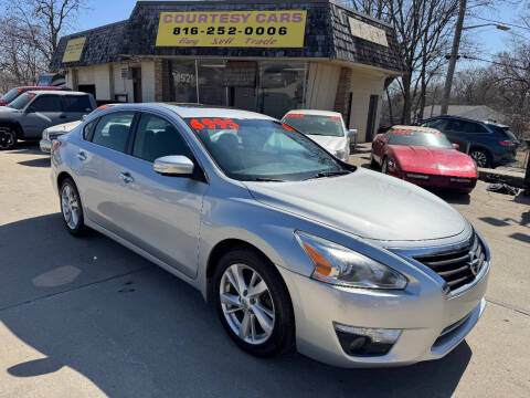 2013 Nissan Altima for sale at Courtesy Cars in Independence MO