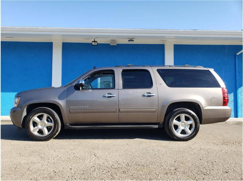 2012 Chevrolet Suburban for sale at Khodas Cars in Gilroy CA