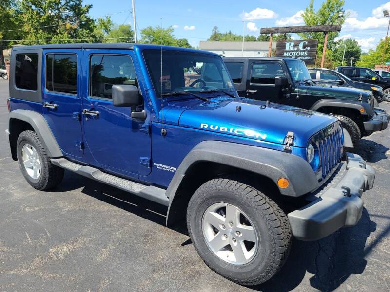 2009 Jeep Wrangler Unlimited for sale at R C Motors in Lunenburg MA