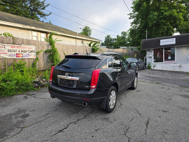 2013 Cadillac SRX for sale at PAKLAND AUTO SALES in Auburn, MA