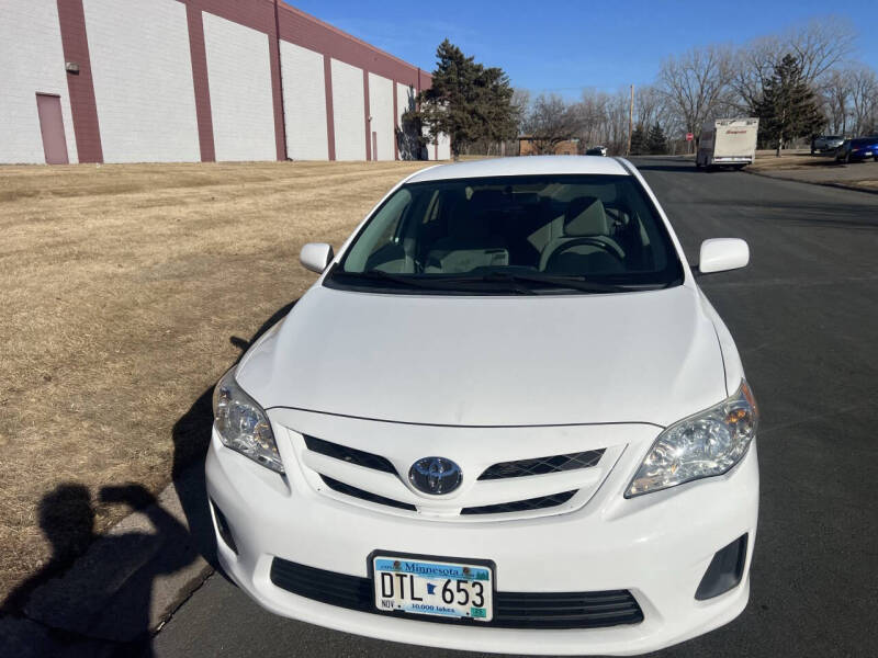 2011 Toyota Corolla for sale at Brighton Unique Auto Inc in New Brighton MN