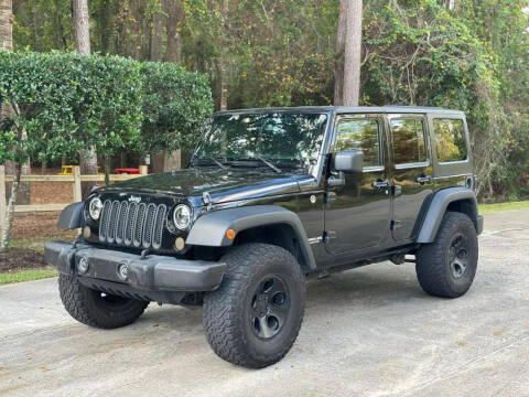 2013 Jeep Wrangler Unlimited for sale at SIMPLE AUTO SALES in Spring TX