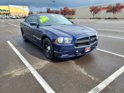 2013 Dodge Charger for sale at SWIFT AUTO SALES INC in Salem OR