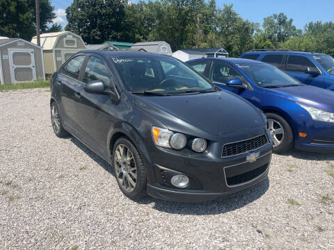 2014 Chevrolet Sonic for sale at HEDGES USED CARS in Carleton MI