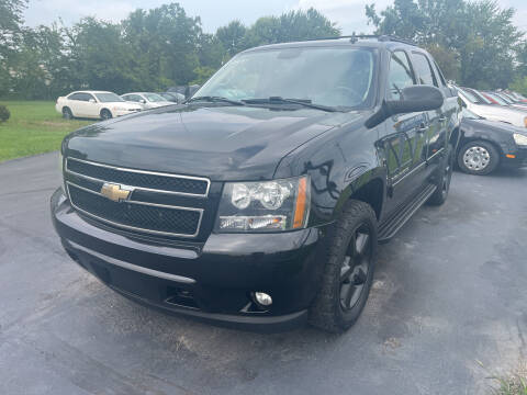 2011 Chevrolet Avalanche for sale at HEDGES USED CARS in Carleton MI