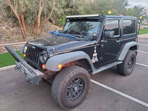 2009 Jeep Wrangler for sale at RENEE'S AUTO WORLD in El Paso TX