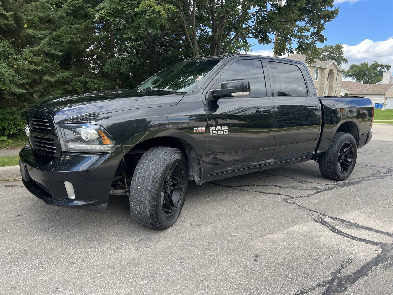 2016 RAM 1500 Sport 4x4 4dr Crew Cab 5.5 ft. SB Pickup's photo