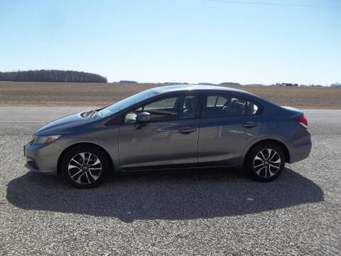 2013 Honda Civic for sale at Howe's Auto Sales in Grelton OH