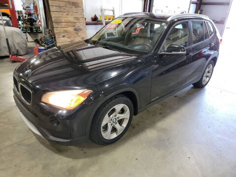 2013 BMW X1 for sale at Hometown Automotive Service & Sales in Holliston MA