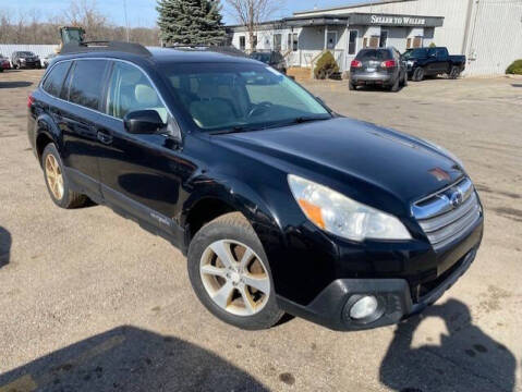 2013 Subaru Outback for sale at WELLER BUDGET LOT in Grand Rapids MI