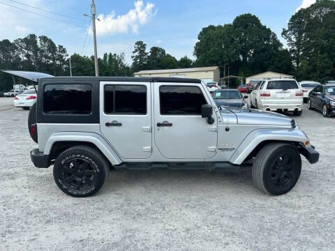 2012 Jeep Wrangler Unlimited for sale at Gwinnett Luxury Motors in Buford GA