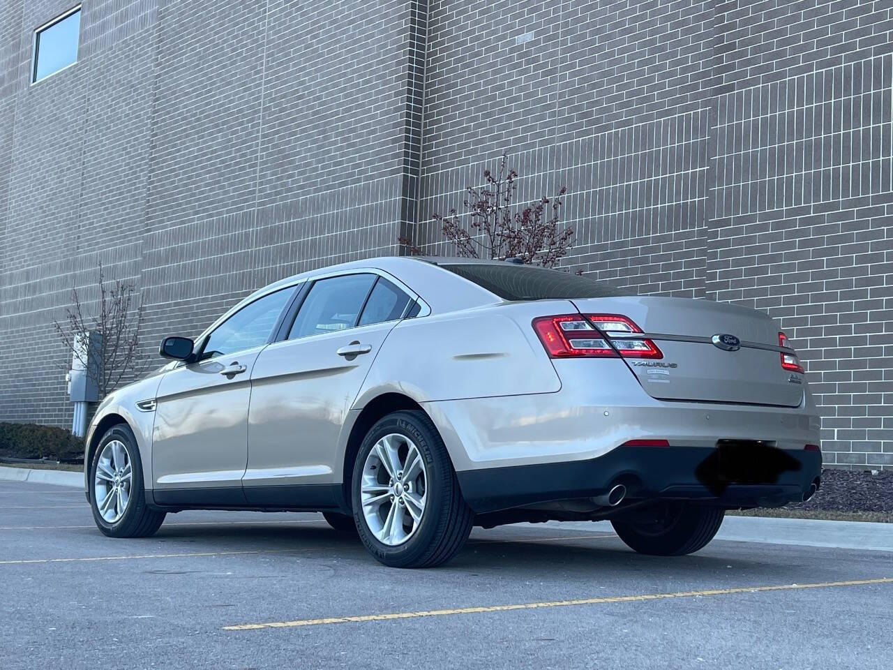 2018 Ford Taurus for sale at Phoenix Motor Co in Romulus, MI