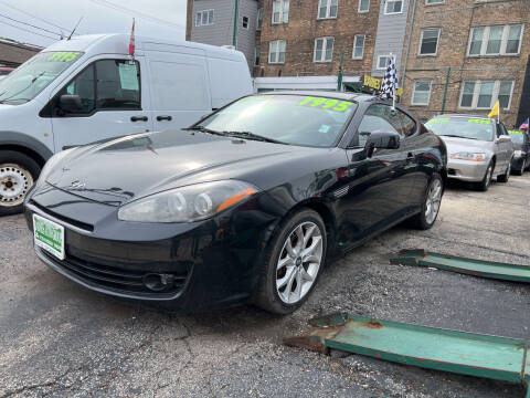 2007 Hyundai Tiburon for sale at Barnes Auto Group in Chicago IL