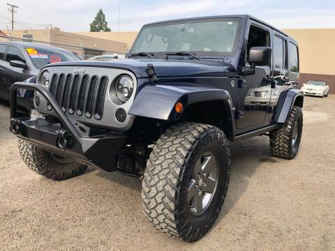 2013 Jeep Wrangler Unlimited for sale at NexCar in Clovis CA