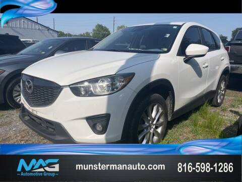 2015 Mazda CX-5 for sale at Munsterman Automotive Group in Blue Springs MO