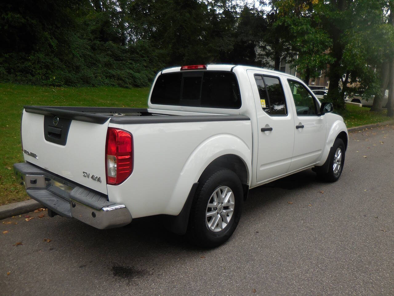 2015 Nissan Frontier for sale at PRESTIGE MOTORS LEASING CORP in Roslyn Heights, NY