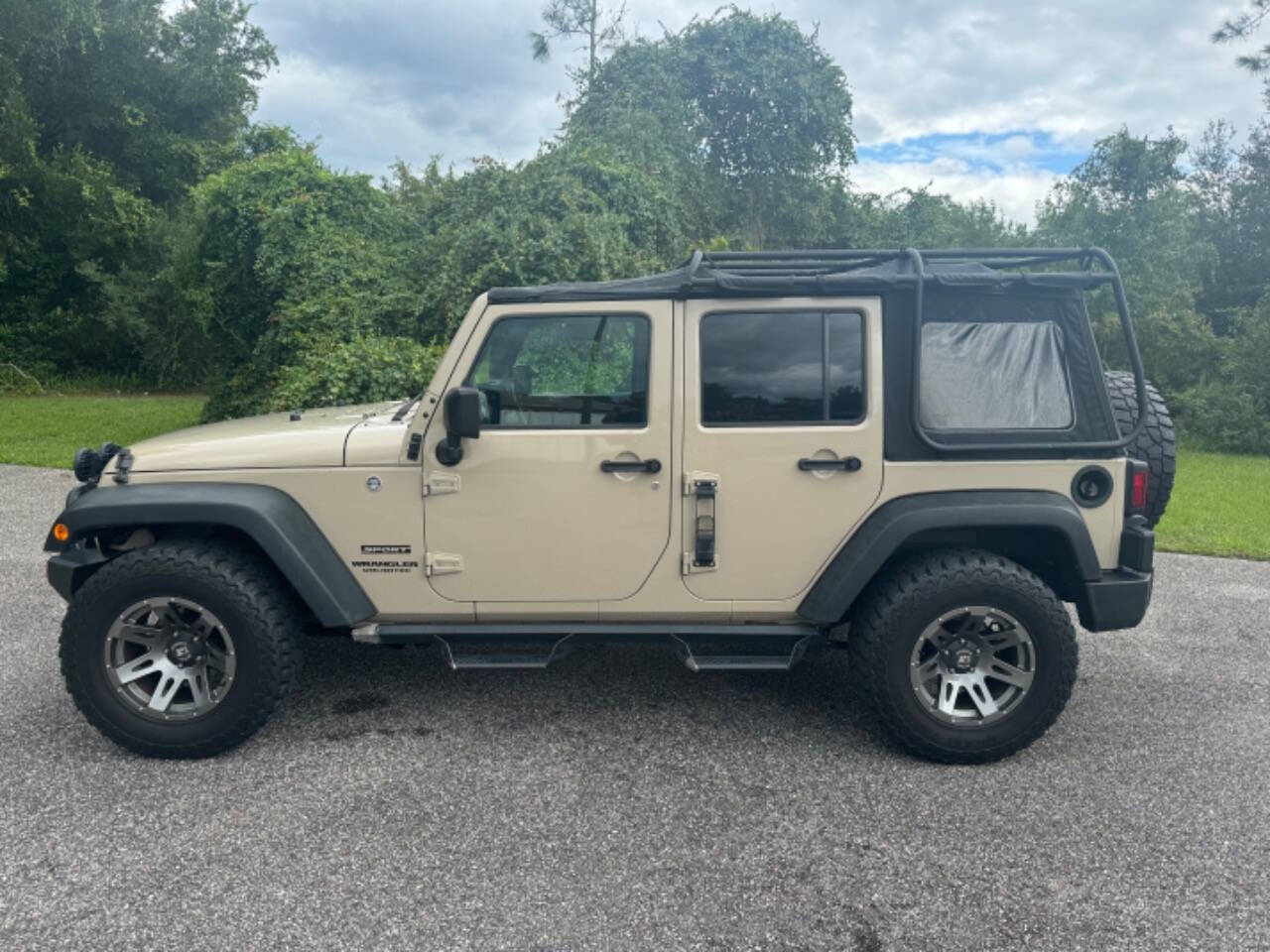 2016 Jeep Wrangler Unlimited for sale at VASS Automotive in DeLand, FL