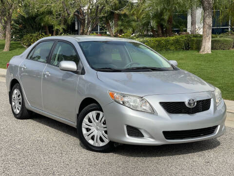 2009 Toyota Corolla for sale at MILLENNIUM MOTORS in Van Nuys CA