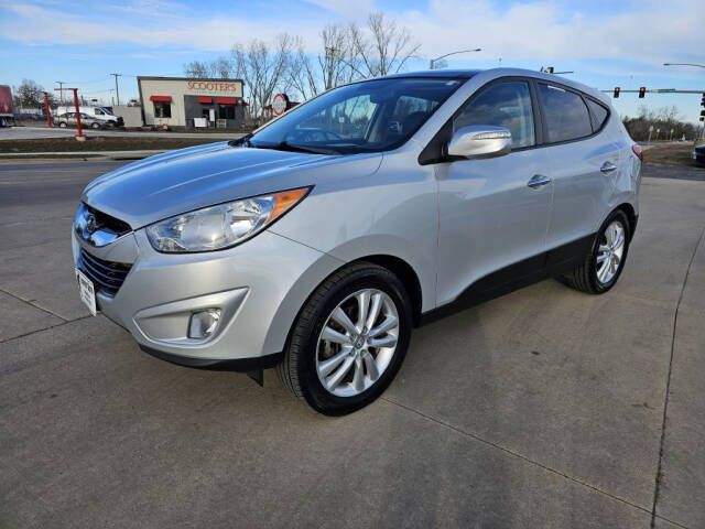 2011 Hyundai TUCSON for sale at Bigfoot Auto in Hiawatha, IA