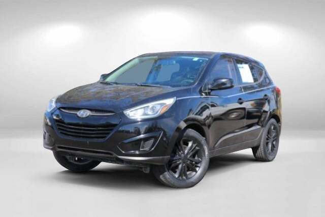 2015 Hyundai Tucson for sale at WOODLAKE MOTORS in Conroe TX