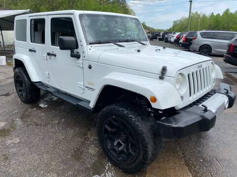2014 Jeep Wrangler Unlimited for sale at Monroe Auto's, LLC in Parsons TN