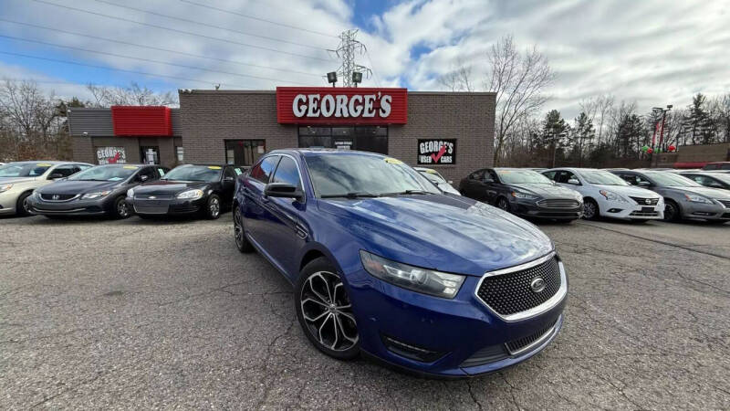 2013 Ford Taurus for sale at George's Used Cars in Brownstown MI