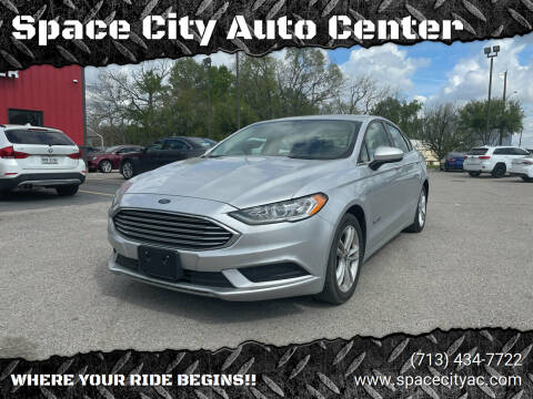 2018 Ford Fusion Hybrid for sale at Space City Auto Center in Houston TX