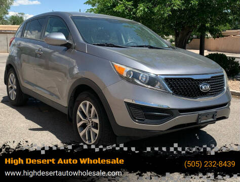 2014 Kia Sportage for sale at High Desert Auto Wholesale in Albuquerque NM