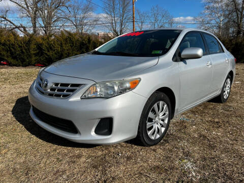 2013 Toyota Corolla for sale at PUTNAM AUTO SALES INC in Marietta OH