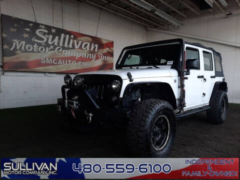 2016 Jeep Wrangler Unlimited for sale at SULLIVAN MOTOR COMPANY INC. in Mesa AZ
