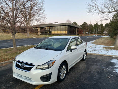 2013 Subaru Impreza for sale at QUEST MOTORS in Englewood CO