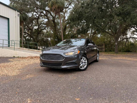 2015 Ford Fusion for sale at Carnaval Auto Group LLC in Tampa FL