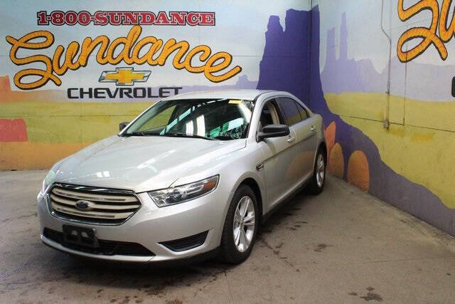 Used 2016 Ford Taurus SE with VIN 1FAHP2D89GG122986 for sale in Grand Ledge, MI