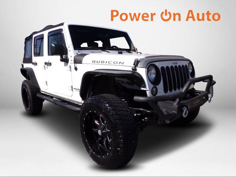 2015 Jeep Wrangler Unlimited for sale at Power On Auto LLC in Monroe NC