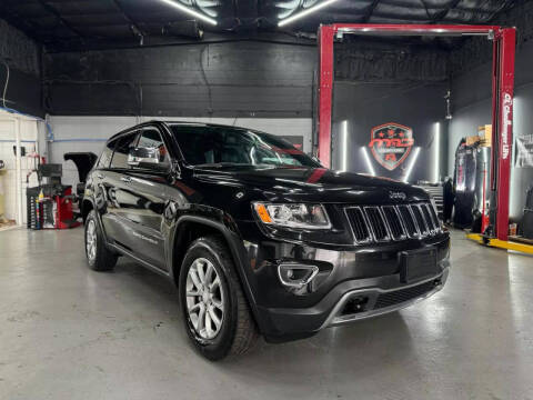 2014 Jeep Grand Cherokee for sale at Mad Auto Sales in Orlando FL